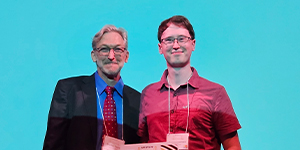 Fabian Liessmann (Leipzig University) receives his student oral presentation award from Dr. Brad Taylor (award sponsored by the University of Pittsburgh Department of Anesthesiology and Perioperative Medicine).